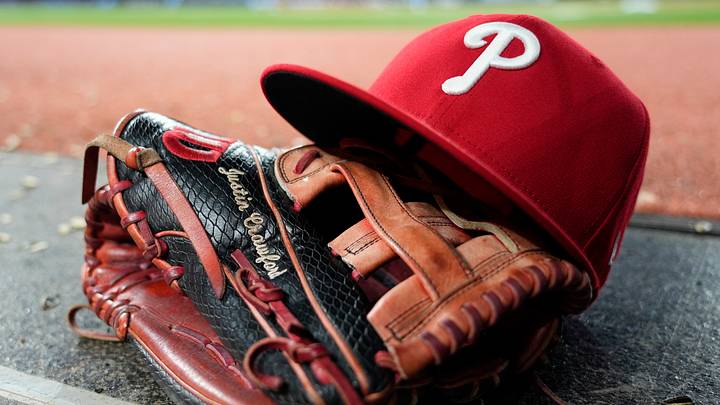 Jun 8, 2026; Toronto, Ontario, CAN; The glove and hat of Philadelphia Phillies center fielder Justin Crawford (2) in the dugout during a game against the Toronto Blue Jays at Rogers Centre. Jun 8, 2026; Toronto, Ontario, CAN; The glove and hat of Philadelphia Phillies center fielder Justin Crawford (2) in the dugout during a game against the Toronto Blue Jays at Rogers Centre.