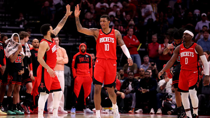 Mar 15, 2025; Houston, Texas, USA; Houston Rockets guard Fred VanVleet (5) congratulates Houston Rockets forward Jabari Smith Jr (10) against the Chicago Bulls during the fourth quarter at Toyota Center. Mandatory Credit: Erik Williams-Imagn Images