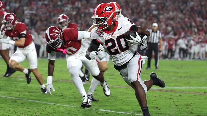 Oct 10, 2026; Tuscaloosa, Alabama, USA; Georgia Bulldogs running back Dwight Phillips Jr. (20) carries the ball against the Alabama Crimson Tide during the first quarter at Saban Field at Bryant-Denny Stadium. Mandatory Credit: David Leong-Imagn Images Oct 10, 2026; Tuscaloosa, Alabama, USA; Georgia Bulldogs running back Dwight Phillips Jr. (20) carries the ball against the Alabama Crimson Tide during the first quarter at Saban Field at Bryant-Denny Stadium. Mandatory Credit: David Leong-Imagn Images