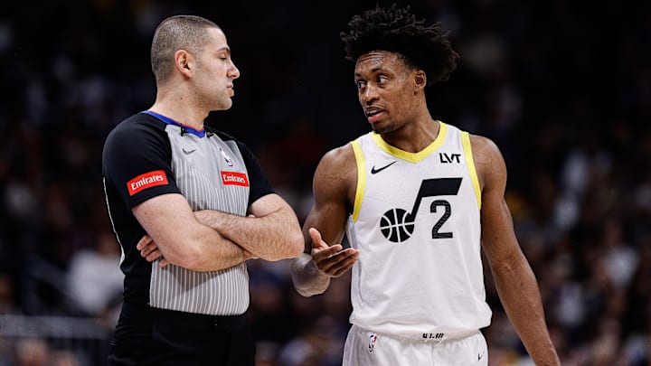 Mar 9, 2024; Denver, Colorado, USA; Utah Jazz guard Collin Sexton (2) talks with referee Mousa