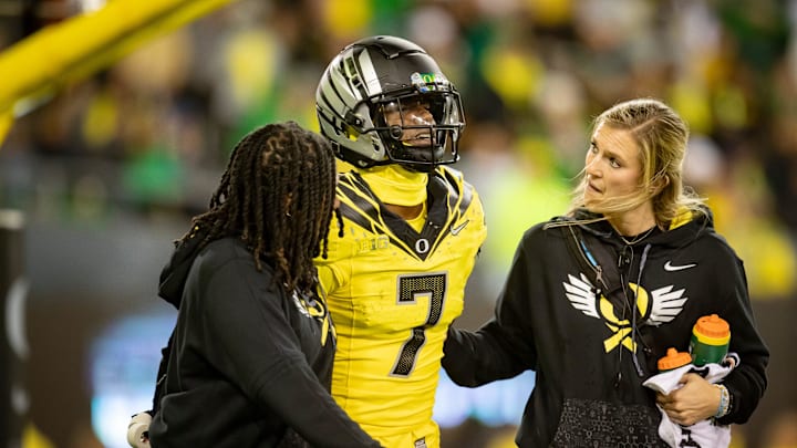 Oregon Ducks wide receiver Evan Stewart is helped off the field as the Ducks host the Spartans Friday, Oct. 4, 2024 at Autzen Stadium in Eugene, Ore. Oregon Ducks wide receiver Evan Stewart is helped off the field as the Ducks host the Spartans Friday, Oct. 4, 2024 at Autzen Stadium in Eugene, Ore.
