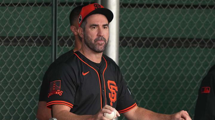Feb 13, 2025; Scottsdale, AZ, USA; San Francisco Giants pitcher Justin Verlander (35) watches players work out in the bullpen during spring training camp. Feb 13, 2025; Scottsdale, AZ, USA; San Francisco Giants pitcher Justin Verlander (35) watches players work out in the bullpen during spring training camp.