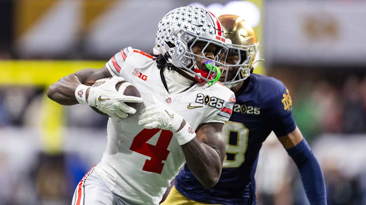 Jan 20, 2025; Atlanta, GA, USA; Ohio State Buckeyes wide receiver Jeremiah Smith (4) against the Notre Dame Fighting Irish during the CFP National Championship college football game at Mercedes-Benz Stadium. Mandatory Credit: Mark J. Rebilas-Imagn Images