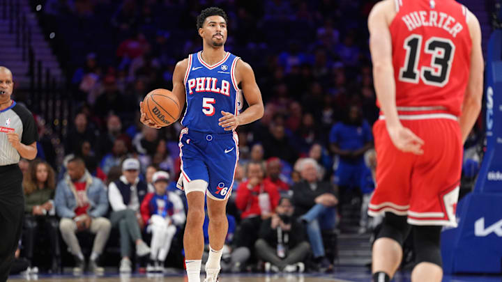 Apr 13, 2025; Philadelphia, Pennsylvania, USA; Philadelphia 76ers guard Quentin Grimes (5) controls the ball against the Chicago Bulls in the first quarter at Wells Fargo Center. Mandatory Credit: Kyle Ross-Imagn Images
