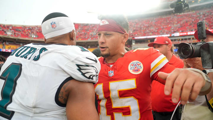 Sep 14, 2025; Kansas City, Missouri, USA; Philadelphia Eagles quarterback Jalen Hurts (1) and Kansas City Chiefs quarterback Patrick Mahomes (15) greet eachother after the game at GEHA Field at Arrowhead Stadium. Mandatory Credit: Jay Biggerstaff-Imagn Images
