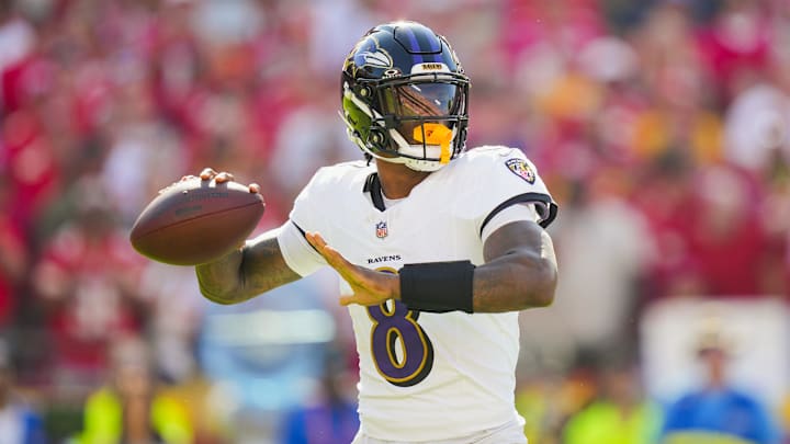 Baltimore Ravens quarterback Lamar Jackson (8) throws a pass during the first half against the Kansas City Chiefs at GEHA Field at Arrowhead Stadium. Baltimore Ravens quarterback Lamar Jackson (8) throws a pass during the first half against the Kansas City Chiefs at GEHA Field at Arrowhead Stadium.