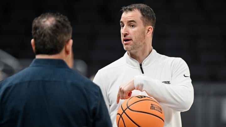 Danny Sprinkle holds court during an NCAA tournament practice. Danny Sprinkle holds court during an NCAA tournament practice.