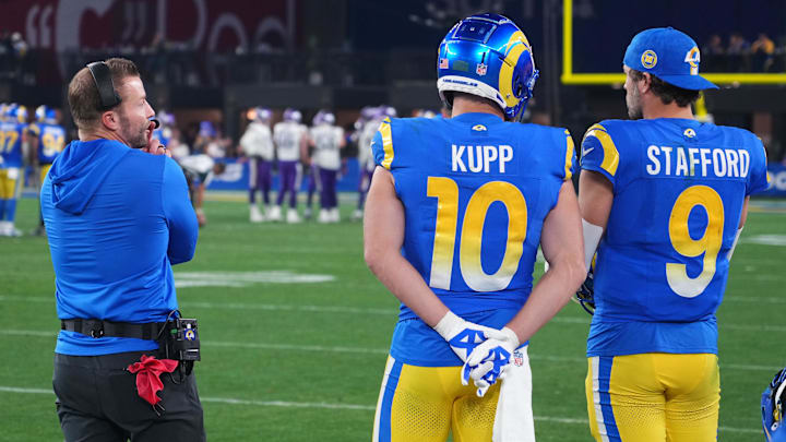 Jan 13, 2025; Glendale, AZ, USA; Los Angeles Rams head coach Sean McVay, quarterback Matthew Stafford (9) and wide receiver Cooper Kupp (10) watch from the sidelines against the Minnesota Vikings during the second half in an NFC wild card game at State Farm Stadium. Mandatory Credit: Joe Camporeale-Imagn Images Jan 13, 2025; Glendale, AZ, USA; Los Angeles Rams head coach Sean McVay, quarterback Matthew Stafford (9) and wide receiver Cooper Kupp (10) watch from the sidelines against the Minnesota Vikings during the second half in an NFC wild card game at State Farm Stadium. Mandatory Credit: Joe Camporeale-Imagn Images