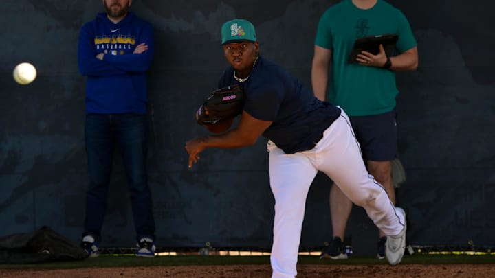 Feb 12, 2026; Peoria, AZ, USA; Seattle Mariners pitcher Jose A. Ferrer throws during a Spring Training workout at Peoria Sports Complex. Mandatory Credit: Matt Kartozian-Imagn Images Feb 12, 2026; Peoria, AZ, USA; Seattle Mariners pitcher Jose A. Ferrer throws during a Spring Training workout at Peoria Sports Complex. Mandatory Credit: Matt Kartozian-Imagn Images