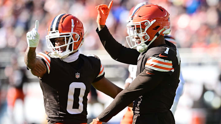 Oct 27, 2024; Cleveland, Ohio, USA; Cleveland Browns cornerback Greg Newsome II (0) and safety Juan Thornhill (1) celebrate after a pass break up during the first half against the Baltimore Ravens at Huntington Bank Field. Mandatory Credit: Ken Blaze-Imagn Images