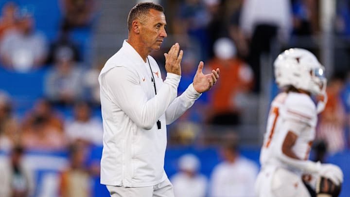 Texas Longhorns head coach Steve Sarkisian claps during warmups before the game against the Kentucky Wildcats at Kroger Field. 