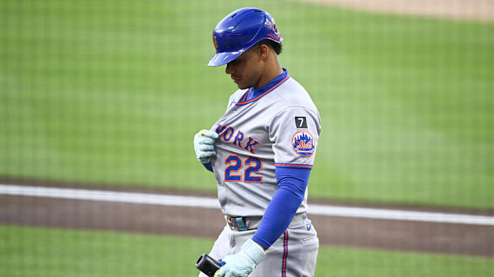 Jul 28, 2025; San Diego, California, USA; New York Mets right fielder Juan Soto (22) walks back to the dugout after striking out during the first inning against the San Diego Padres at Petco Park. Mandatory Credit: Denis Poroy-Imagn Images
