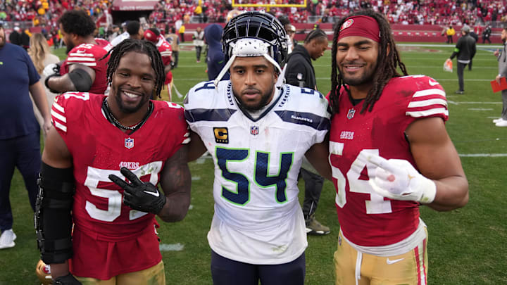 Dec 10, 2023; Santa Clara, California, USA; Seattle Seahawks linebacker Bobby Wagner (center) poses for a photo with San Francisco 49ers linebackers Dre Greenlaw (left) and linebacker Fred Warner (right) after the game at Levi's Stadium. Mandatory Credit: Darren Yamashita-Imagn Images Dec 10, 2023; Santa Clara, California, USA; Seattle Seahawks linebacker Bobby Wagner (center) poses for a photo with San Francisco 49ers linebackers Dre Greenlaw (left) and linebacker Fred Warner (right) after the game at Levi's Stadium. Mandatory Credit: Darren Yamashita-Imagn Images