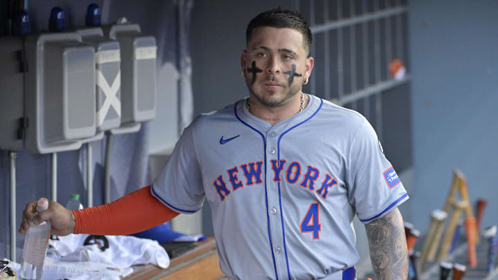 Oct 20, 2024; Los Angeles, California, USA; New York Mets catcher Francisco Alvarez (4) looks on in the dugout before game six against the Los Angeles Dodgers in the NLCS for the 2024 MLB playoffs at Dodger Stadium. Mandatory Credit: Jayne Kamin-Oncea-Imagn Images Oct 20, 2024; Los Angeles, California, USA; New York Mets catcher Francisco Alvarez (4) looks on in the dugout before game six against the Los Angeles Dodgers in the NLCS for the 2024 MLB playoffs at Dodger Stadium. Mandatory Credit: Jayne Kamin-Oncea-Imagn Images