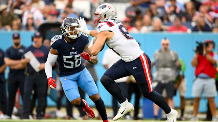Nov 3, 2024; Nashville, Tennessee, USA; New England Patriots tight end Austin Hooper (81) stiff arms Tennessee Titans linebacker Harold Landry III (58) during the first half at Nissan Stadium. Mandatory Credit: Steve Roberts-Imagn Images Nov 3, 2024; Nashville, Tennessee, USA; New England Patriots tight end Austin Hooper (81) stiff arms Tennessee Titans linebacker Harold Landry III (58) during the first half at Nissan Stadium. Mandatory Credit: Steve Roberts-Imagn Images