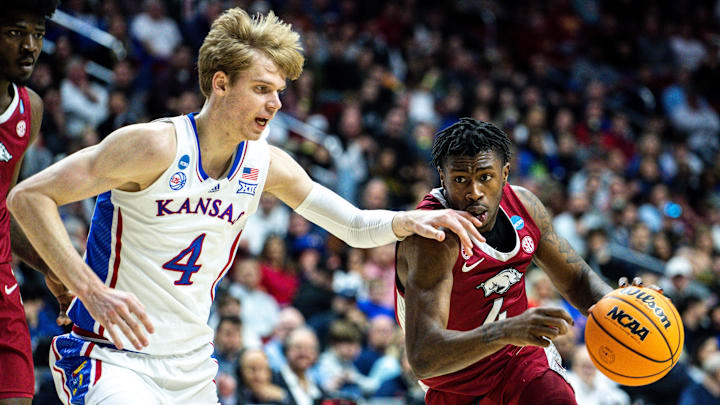 Arkansas guard Davonte Davis drives to the basket against Kansas guard Gradey Dick during an NCAA men  s basketball tournament second round basketball game on Saturday, March 18, 2023, at Wells Fargo Arena, in Des Moines, Iowa.