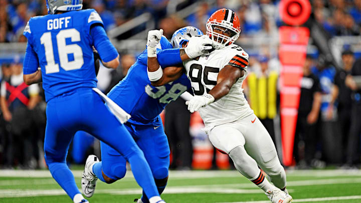 Sep 28, 2025; Detroit, Michigan, USA; Cleveland Browns defensive end Myles Garrett (95) tries to get around Detroit Lions offensive tackle Penei Sewell (58) during the second half at Ford Field. Mandatory Credit: Lon Horwedel-Imagn Images