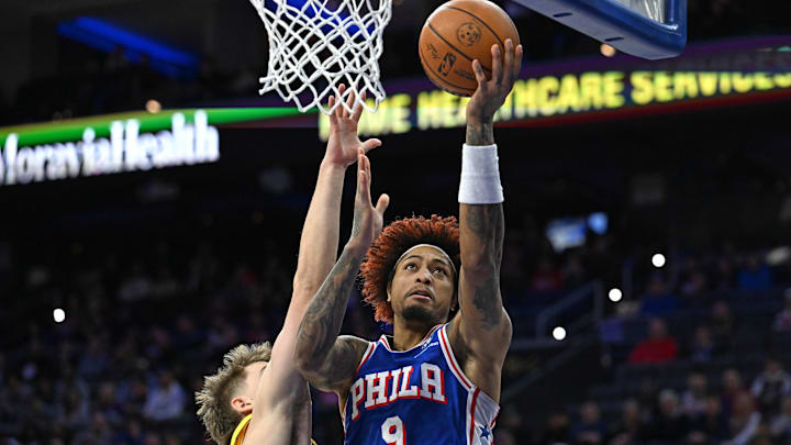 Jan 19, 2026; Philadelphia, Pennsylvania, USA; Philadelphia 76ers guard Kelly Oubre Jr. (9) drives to the basket past Indiana Pacers guard Johnny Furphy (12) during the first quarter at Xfinity Mobile Arena. Mandatory Credit: Eric Hartline-Imagn Images