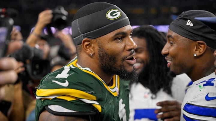Green Bay Packers defensive end Micah Parsons talks with his former teammates after the game between the Dallas Cowboys and the Green Bay Packers at AT&T Stadium. Green Bay Packers defensive end Micah Parsons talks with his former teammates after the game between the Dallas Cowboys and the Green Bay Packers at AT&T Stadium.