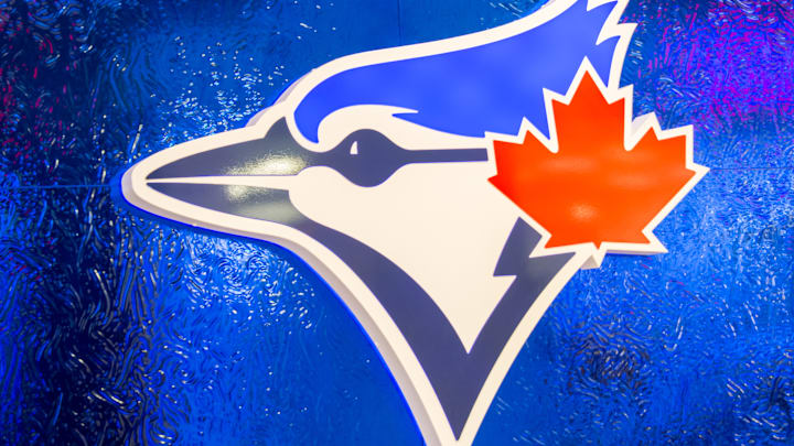 Square Logo of the Toronto Blue Jays baseball team on a blue...