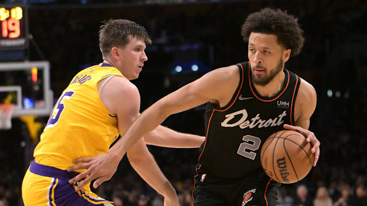 Feb 13, 2024; Los Angeles, California, USA; Los Angeles Lakers guard Austin Reaves (15) defends Detroit Pistons guard Cade Cunningham (2) in the second half at Crypto.com Arena. Mandatory Credit: Jayne Kamin-Oncea-Imagn Images Feb 13, 2024; Los Angeles, California, USA; Los Angeles Lakers guard Austin Reaves (15) defends Detroit Pistons guard Cade Cunningham (2) in the second half at Crypto.com Arena. Mandatory Credit: Jayne Kamin-Oncea-Imagn Images