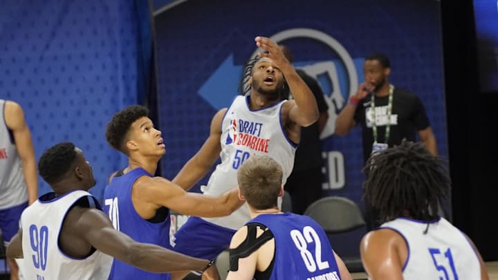 May 15, 2024; Chicago, IL, USA; Bronny James (50) takes a shot during the 2024 NBA Draft Combine at