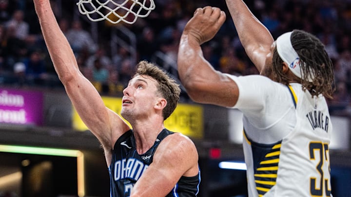 Orlando Magic forward Franz Wagner (22) shoots the ball while Indiana Pacers center Myles Turner (33) defends in the second half at Gainbridge Fieldhouse.