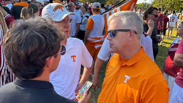 SI.com's Bryce McKinnis visits with Tennessee fans during ESPN College GameDay in Norman on Sep. 21, 2024.