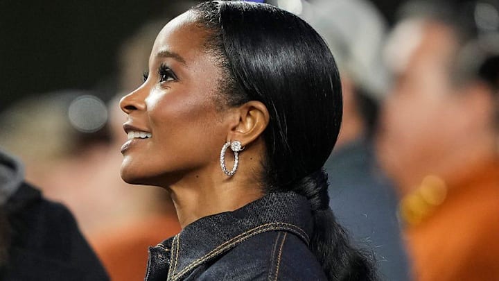 Loreal Sarkisian watches warm ups before a game against Texas Tech.