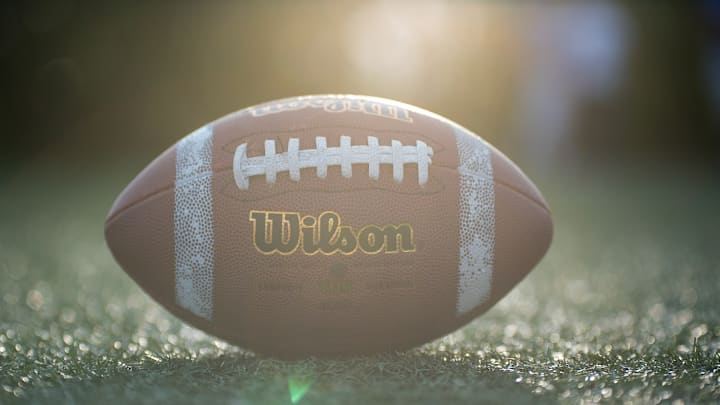 Image of a football on a field Image of a football on a field