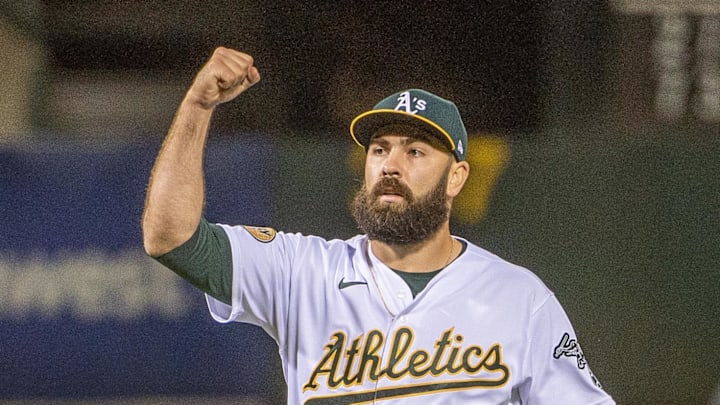 Oakland Athletics relief pitcher Lou Trivino (62) celebrates after defeating the Houston Astros at RingCentral Coliseum in 2022.