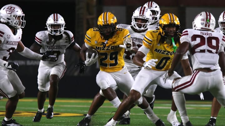 Sept 27, 2025; Columbia, Missouri, USA; Missouri Tigers running back Ahmad Hardy (29) directs himself through traffic during a game against UMass. Sept 27, 2025; Columbia, Missouri, USA; Missouri Tigers running back Ahmad Hardy (29) directs himself through traffic during a game against UMass.