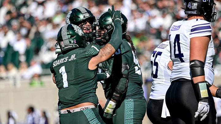 Michigan State’s Ben Roberts, right, celebrates his sack against Northwestern with Eli Coenen, center, and Kenny Soares Jr. during the fourth quarter on Saturday, Oct. 17, 2026, at Spartan Stadium in East Lansing.