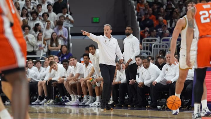 Chris Collins coaches his players on the court vs. Illinois. Chris Collins coaches his players on the court vs. Illinois.