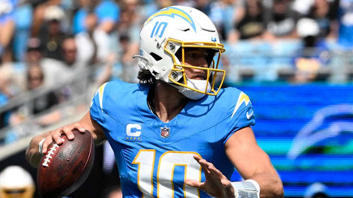 Sep 15, 2024; Charlotte, North Carolina, USA;  Los Angeles Chargers quarterback Justin Herbert (10) looks to pass in the second quarter at Bank of America Stadium. Mandatory Credit: Bob Donnan-Imagn Images