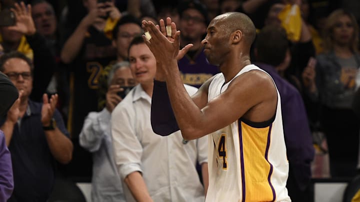 Mar 13, 2016; Los Angeles, CA, USA; Los Angeles Lakers forward Kobe Bryant (24) claps as he exits the court after the game against the New York Knicks at Staples Center. The New York Knicks won 90-87. Mandatory Credit: Kelvin Kuo-Imagn Images
