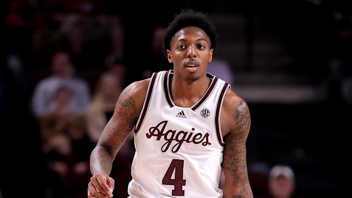 Dec 30, 2023; College Station, Texas, USA; Texas A&M Aggies guard Wade Taylor IV (4) handles the
