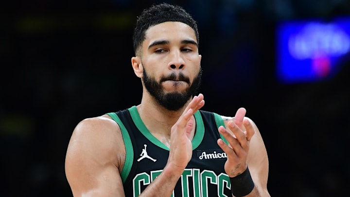 Apr 2, 2025; Boston, Massachusetts, USA; Boston Celtics forward Jayson Tatum (0) reacts after a play during the first half against the Miami Heat at TD Garden. Mandatory Credit: Bob DeChiara-Imagn Images