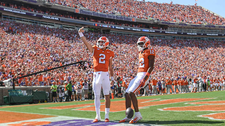 Sep 21, 2024; Clemson, South Carolina, USA; Clemson Tigers quarterback Cade Klubnik (2) waves to the crowd after running in for a touchdown against the North Carolina State Wolfpack at Memorial Stadium. Sep 21, 2024; Clemson, South Carolina, USA; Clemson Tigers quarterback Cade Klubnik (2) waves to the crowd after running in for a touchdown against the North Carolina State Wolfpack at Memorial Stadium.