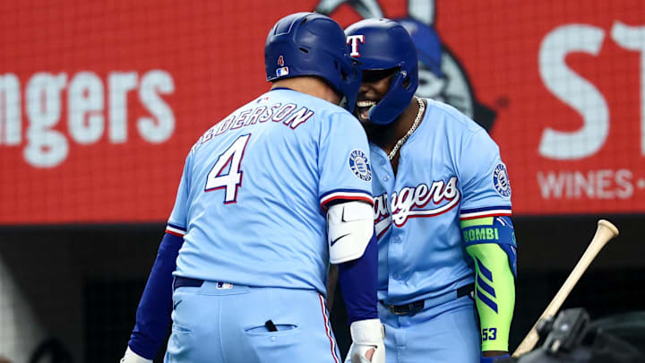 Aug 10, 2025; Arlington, Texas, USA;  Texas Rangers designated hitter Joc Pederson (4) celebrates with Texas Rangers right fielder Adolis Garcia (53) after hitting a two-run home run during the first inning against the Philadelphia Phillies at Globe Life Field. 