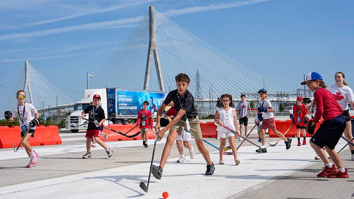 Kids play street hockey before the Gordie Howe International Bridge Canadian Celebration in Windsor on Friday, July 24, 2026. Kids play street hockey before the Gordie Howe International Bridge Canadian Celebration in Windsor on Friday, July 24, 2026.