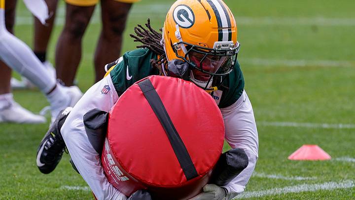 Green Bay Packers safety Javon Bullard goes through a tackling drill at OTAs on Wednesday.