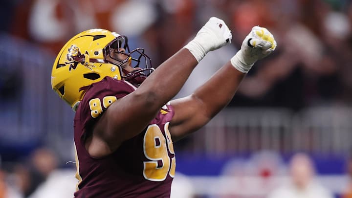 Jan 1, 2025; Atlanta, GA, USA; Arizona State Sun Devils defensive lineman C.J. Fite (99) celebrates after a play against the Texas Longhorns during the second half of the Peach Bowl at Mercedes-Benz Stadium. Mandatory Credit: Brett Davis-Imagn Images Jan 1, 2025; Atlanta, GA, USA; Arizona State Sun Devils defensive lineman C.J. Fite (99) celebrates after a play against the Texas Longhorns during the second half of the Peach Bowl at Mercedes-Benz Stadium. Mandatory Credit: Brett Davis-Imagn Images