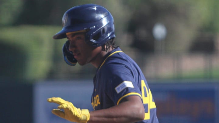 Milwaukee Brewers outfield prospect Yophery Rodriguez goes to bat during a spring training game in March 2024. Milwaukee Brewers outfield prospect Yophery Rodriguez goes to bat during a spring training game in March 2024.