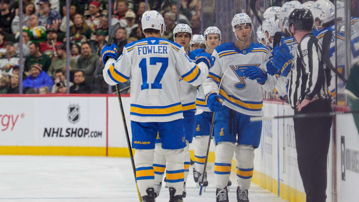 Mar 1, 2026; Saint Paul, Minnesota, USA; St. Louis Blues defenseman Logan Mailloux (23) skates by the bench in celebration after scoring on the Minnesota Wild in the second period at Grand Casino Arena. Mandatory Credit: Matt Blewett-Imagn Images Mar 1, 2026; Saint Paul, Minnesota, USA; St. Louis Blues defenseman Logan Mailloux (23) skates by the bench in celebration after scoring on the Minnesota Wild in the second period at Grand Casino Arena. Mandatory Credit: Matt Blewett-Imagn Images