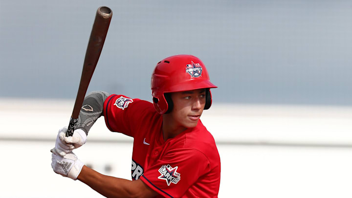 Jun 17, 2019; Bradenton, FL, USA; Team Larkin midfielder Carson Tucker (18) hits during batting practice at IMG Academy. Mandatory Credit: Kim Klement-Imagn Images