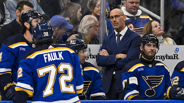 St. Louis Blues Drew Bannister looks on
