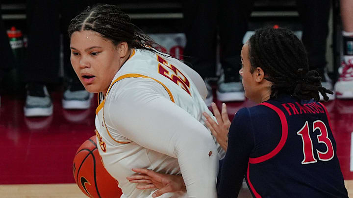 Iowa State Cyclones' center Audi Crooks (55) looks for drive to the basket as Arizona Wildcats forward Nora Francois (13) defends during the third quarter in the Big-12 women’s basketball on Jan. 24, 2026, at Hilton Coliseum in Ames, Iowa.