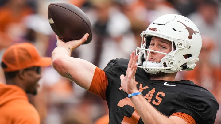 Texas Longhorns quarterback Quinn Ewers (3) throws a pass while warming up ahead of the Longhorns' spring Orange and White game at Darrell K Royal Texas Memorial Stadium in Austin, Texas, April 20, 2024.