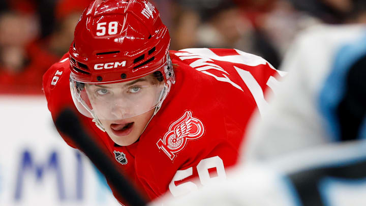 Dec 17, 2025; Detroit, Michigan, USA;  Detroit Red Wings center Emmitt Finnie (58) gets set during a face off in the second period against the Utah Mammoth at Little Caesars Arena. Mandatory Credit: Rick Osentoski-Imagn Images